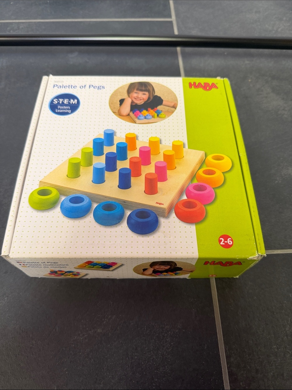 HABA Rainbow Whirls Wooden Sorting
& Stacking Rings Shape Sorter